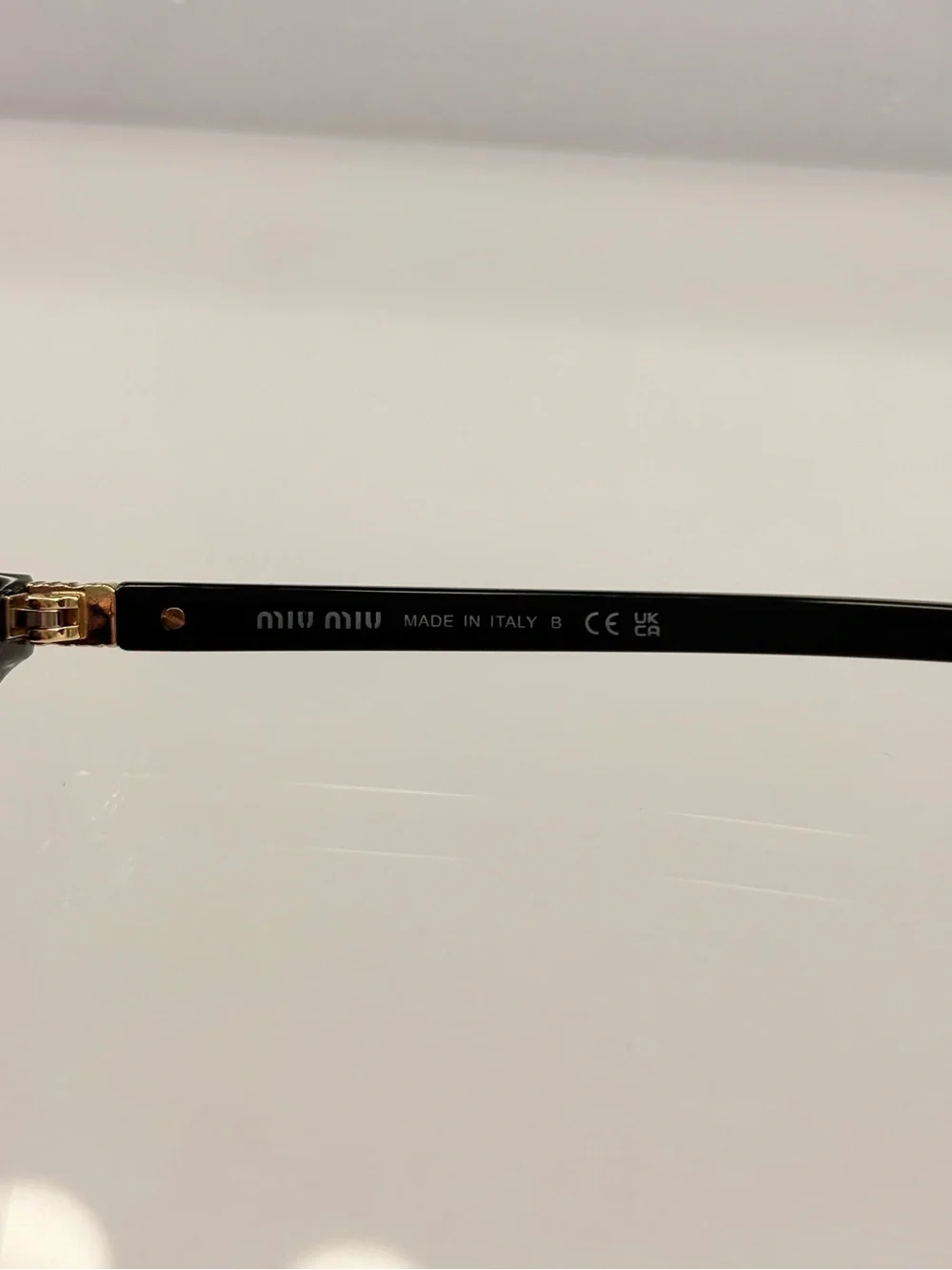 Miu Miu MU 04ZS